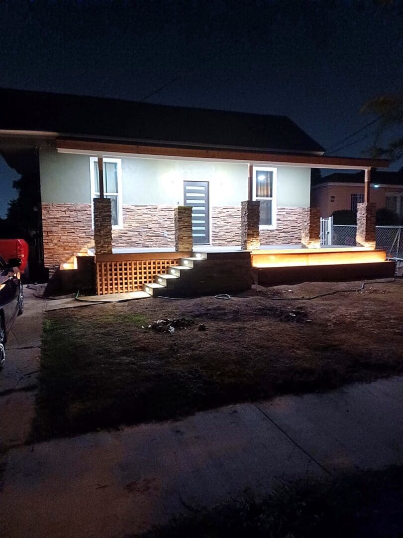 Porch renovation at night by Green's Construction, Los Angeles